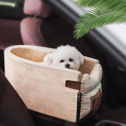 Portable pet seat carrier with plush, machine-washable cushion in car, featuring soft beige fabric, provides comfort and security for small dogs.